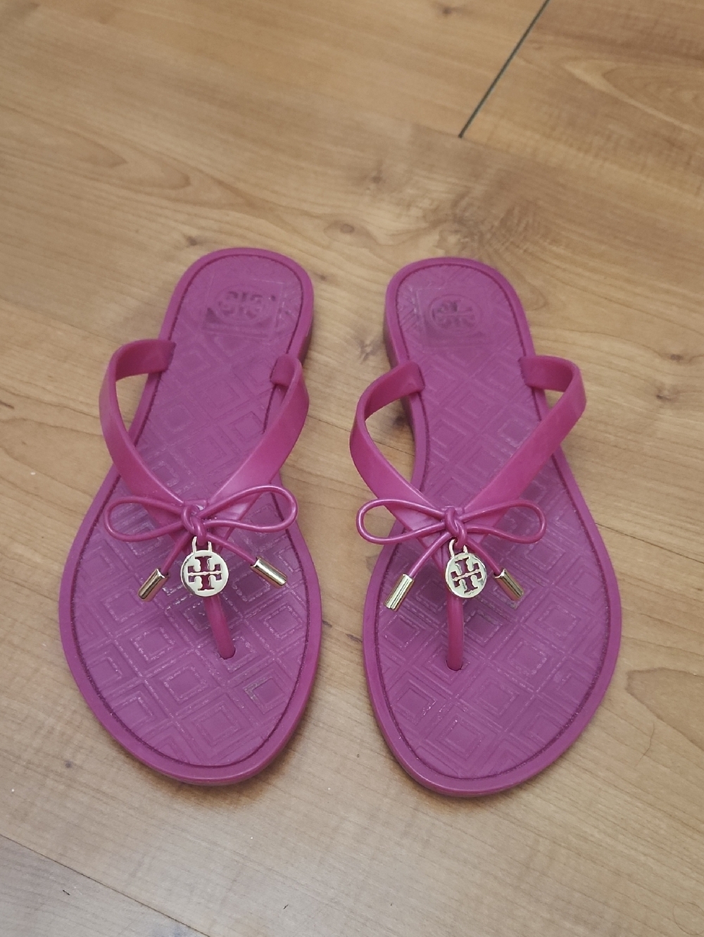Tory Burch Hot Pink Bow Jelly Sandals with Logo Charm